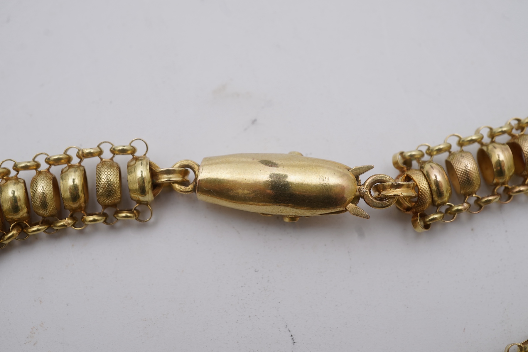 A gold long guard chain, 19th century